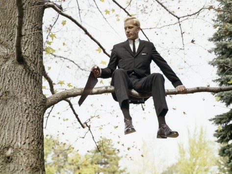 h-armstrong-roberts-1960s-man-in-tree-sawing-off-the-branch-he-is-sitting-on